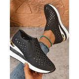 Trendsi women's breathable wedge sneakers in black with heart-shaped cutouts and white sole
