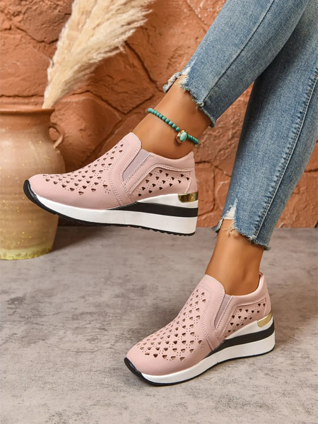 women's breathable wedge sneakers in pink with perforated design and white sole