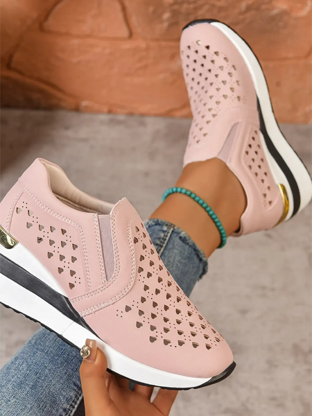 Trendsi women's breathable wedge sneakers in light pink with perforated design and white sole