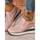 Trendsi women's breathable wedge sneakers in pink with perforated design and gold accent on platform soles