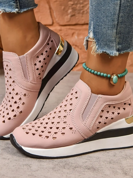 Trendsi women's breathable wedge sneakers in pink with perforated design and gold accent on platform soles