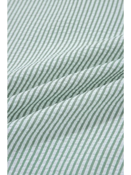 Close-up of green and white striped fabric of women's casual sleeveless shirt by Babe Beachwaer