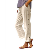 Babe Beachwear women's casual white vacation pants with side button details and pockets