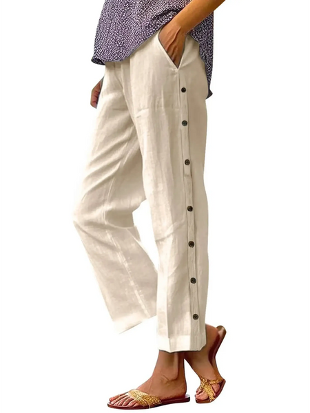 Babe Beachwear women's casual white vacation pants with side button details and pockets