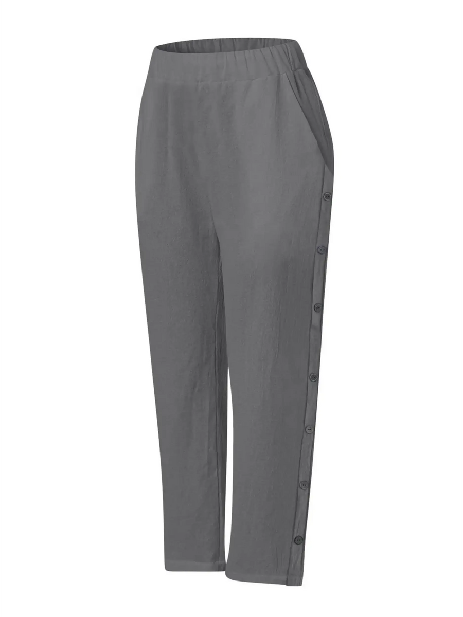 Babe Beachwear women's casual white vacation pants with button detailing and elastic waistband