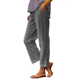 Babe Beachwear women's casual white vacation pants with side buttons and a relaxed fit