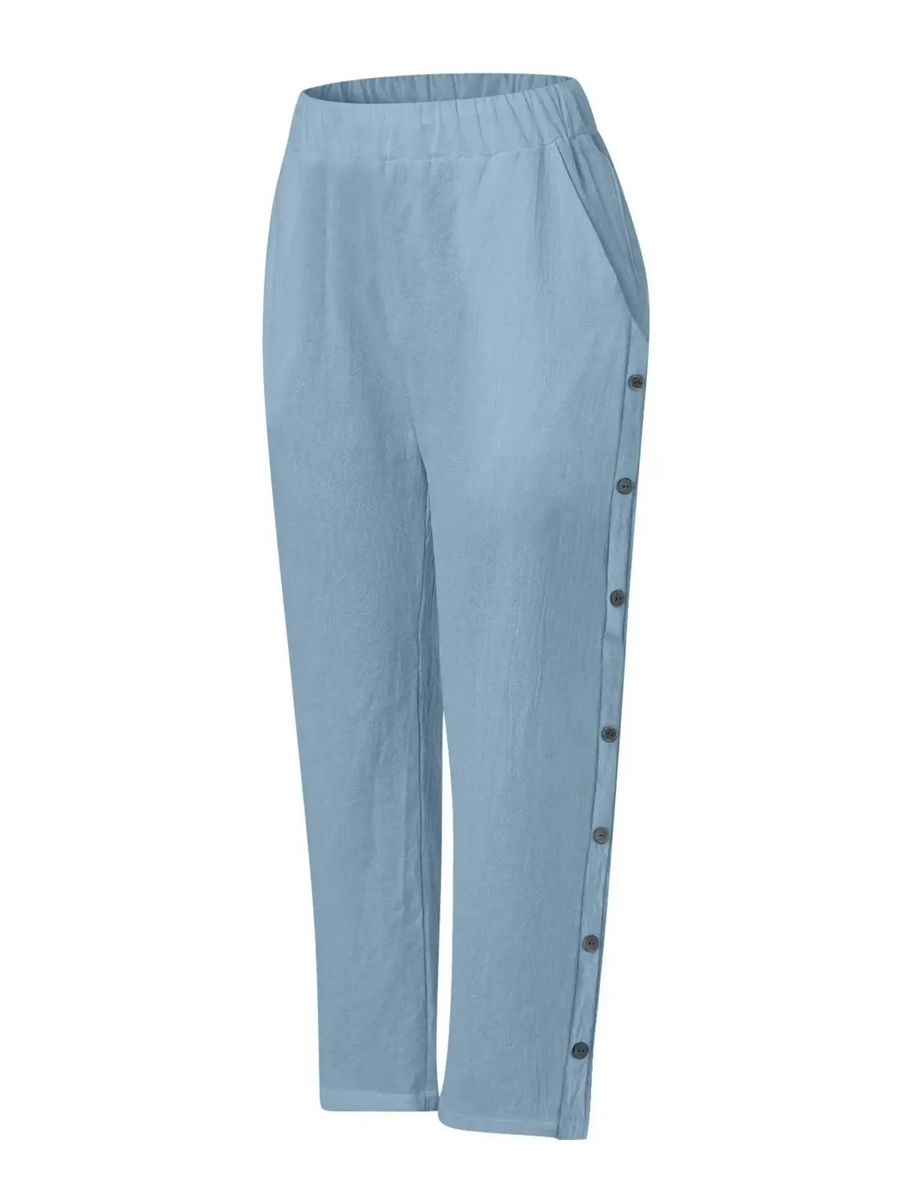 Babe Beachwear light blue pants with side buttons, styled for women's casual white vacation pants