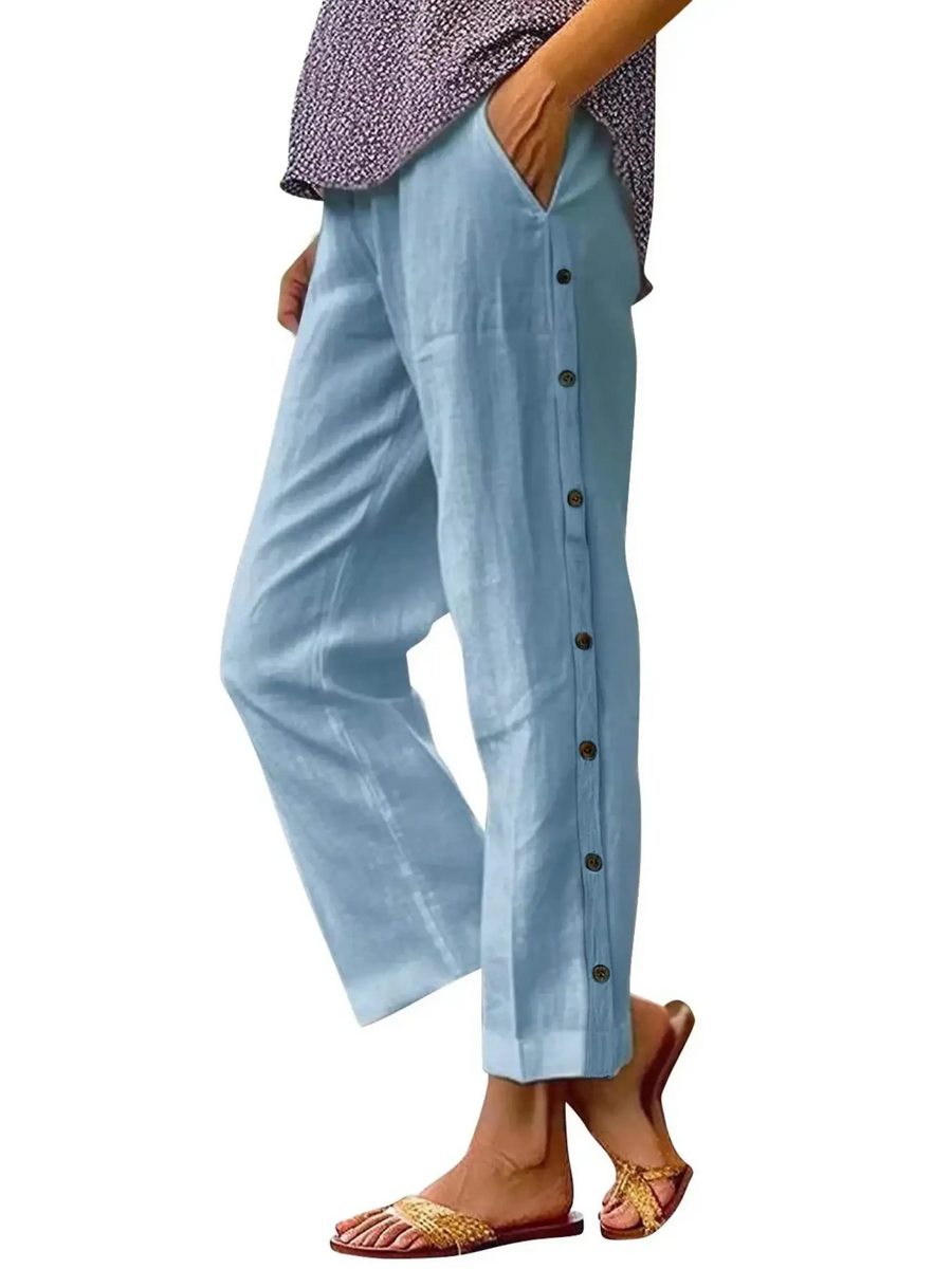 Babe Beachwear women's casual white vacation pants with side button detailing and relaxed fit