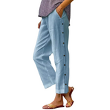 Babe Beachwear women's casual white vacation pants with side button detailing and relaxed fit