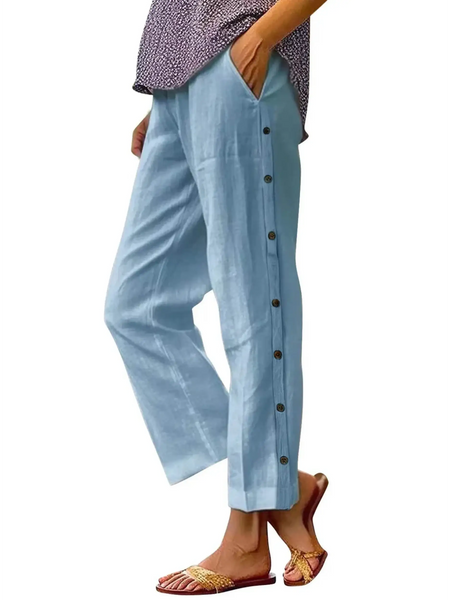 Babe Beachwear women's casual white vacation pants with side button detailing and relaxed fit