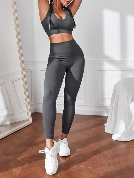 Dark grey Trendsi women's compression leggings set in dark gray with matching sports bra and white sneakers