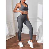 Trendsi women's compression leggings set in gray with matching sports bra and white sneakers