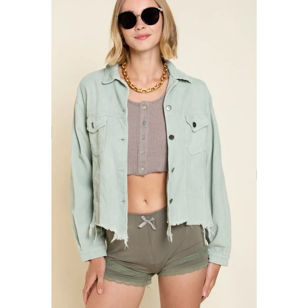 Beachy women's corduroy trucker jacket in light green with raw hem and button front