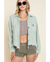 Beachy women's corduroy trucker jacket in light green with raw hem and button front