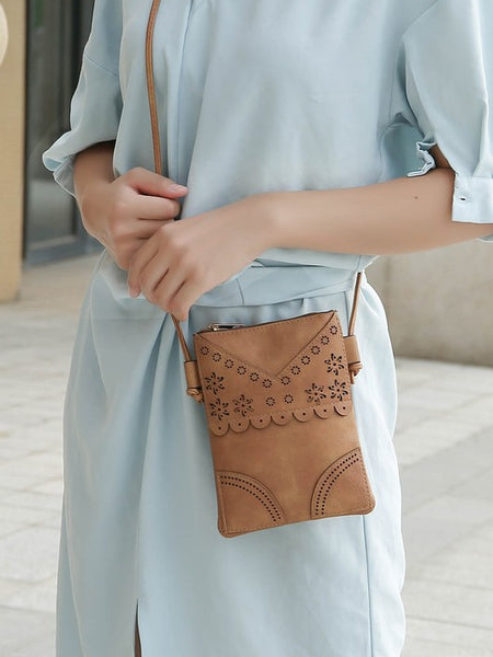 MKF Collection by Mia K women's crossbody beach bag in tan with floral cutout design and adjustable strap