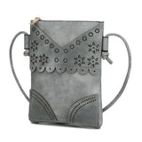 MKF Collection women's crossbody beach bag in gray with floral cutout design and adjustable strap