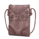 MKF Collection by Mia K women's crossbody beach bag in mauve with decorative floral cutouts and adjustable strap