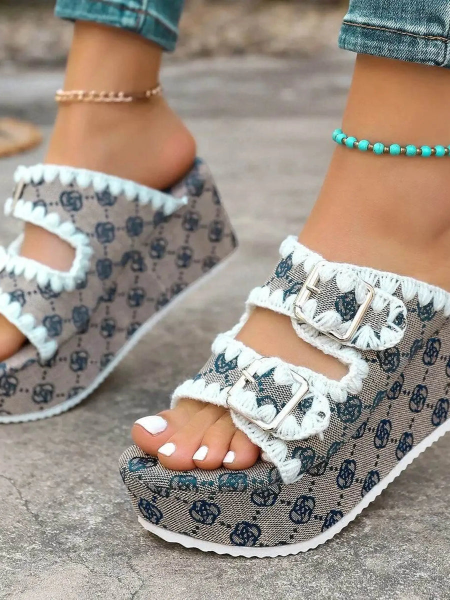 Babe Beachwear women's double buckle sandals with patterned fabric and white trim on a wedge sole