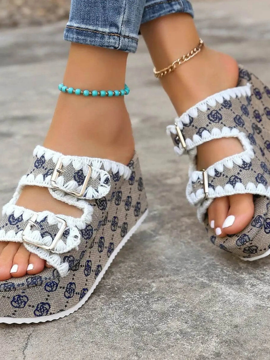Babe Beachwear women's double buckle sandals with patterned fabric and white trim on worn feet