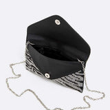 Babe Beachwear women's evening bag with rhinestones and silver chain strap open showing interior