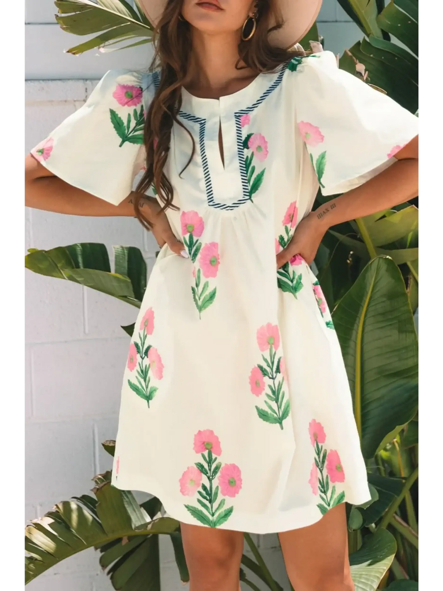Trendsi women's flutter sleeve vacation dress in white with pink floral embroidery and relaxed fit