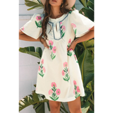 Trendsi women's flutter sleeve vacation dress in white with pink floral embroidery and relaxed fit