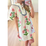 Trendsi women's flutter sleeve vacation dress with pink floral print and striped neckline detail