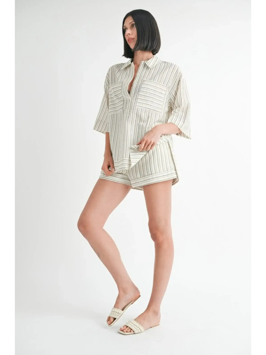 Emory Park women's linen shorts set in striped light fabric with matching oversized shirt and white sandals