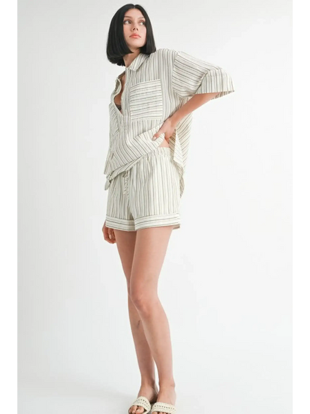 Emory Park women's linen shorts with matching striped top worn by model in casual outfit