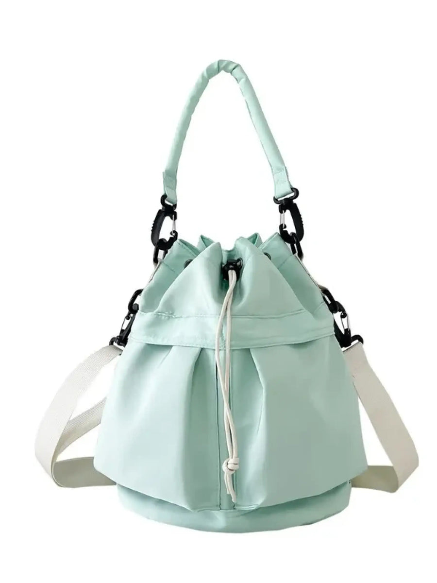 Trendsi light green women's nylon bucket bag with drawstring closure and white adjustable shoulder strap