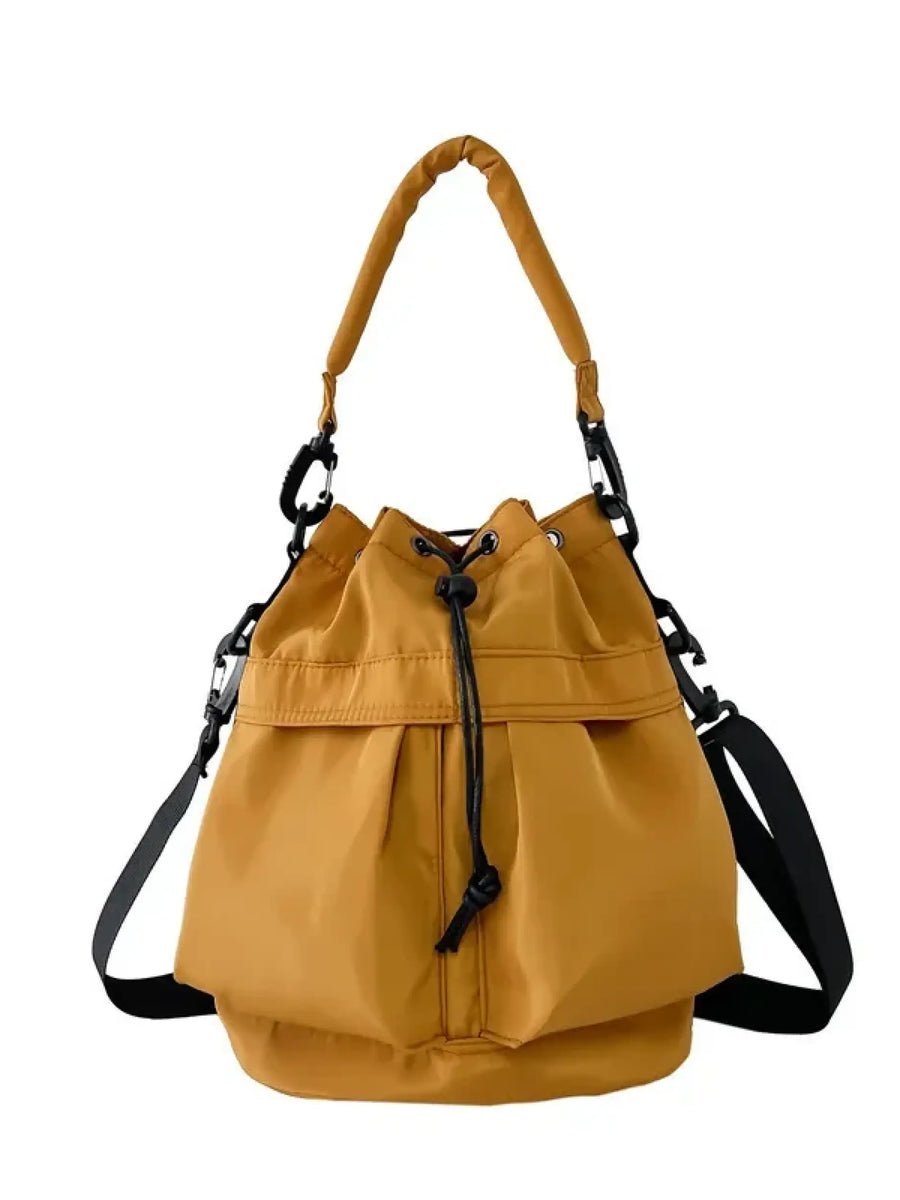 Trendsi women's nylon bucket bag in mustard yellow with adjustable shoulder and handle straps