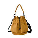 Trendsi women's nylon bucket bag in mustard yellow with adjustable shoulder and handle straps
