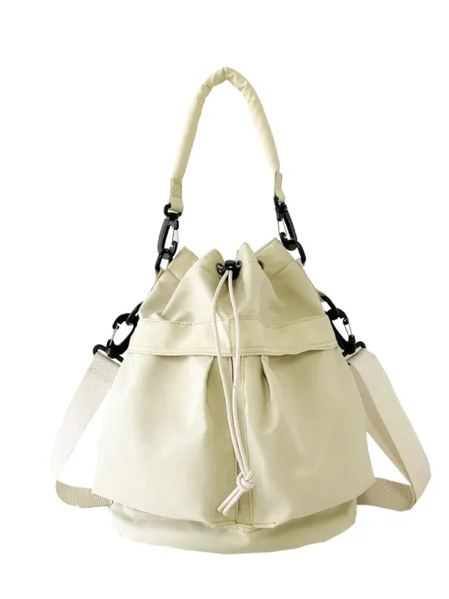 Trendsi women's nylon bucket bag in cream color with adjustable straps and drawstring closure