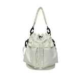 White women's nylon bucket bag with adjustable strap and drawstring closure from Trendsi