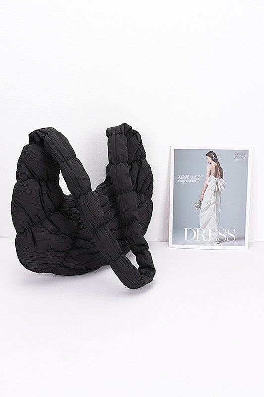 Black Babe Beachwear women's puffer hobo bag with quilted design and padded texture