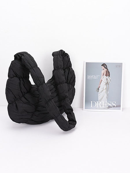 Black Babe Beachwear women's puffer hobo bag with quilted design and padded texture
