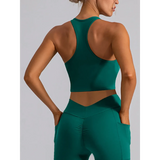 Babe Beachwear women's racerback crop top in green active tank style shown from the back