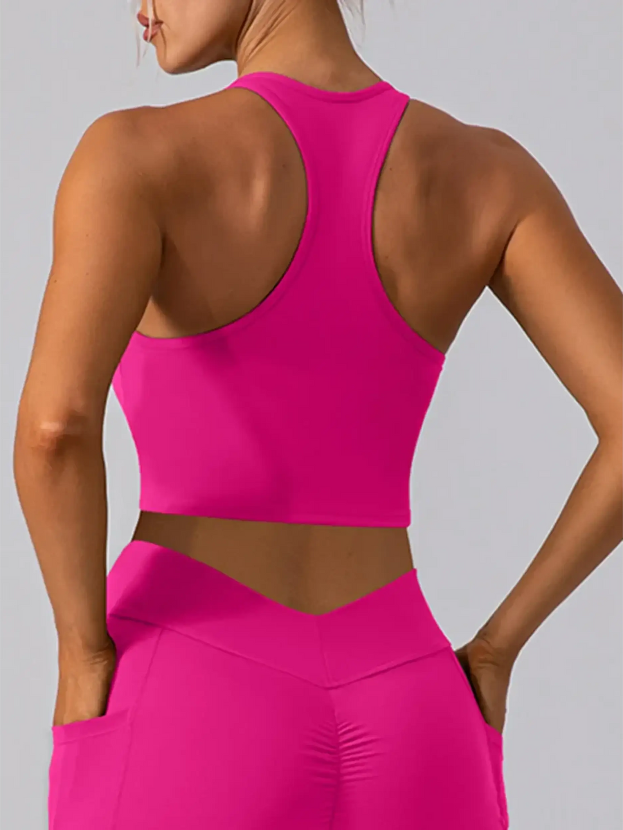 Babe Beachwear women's racerback crop top active tank in bright pink showing back view