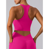 Babe Beachwear women's racerback crop top active tank in bright pink showing back view