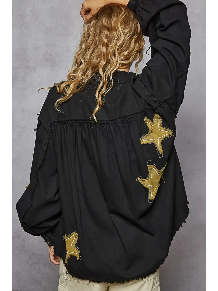 Back view of women's raw hem button up jacket in black with star patches and long sleeves by Trendsi