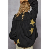 Back view of women's raw hem button up jacket in black with star patches and long sleeves by Trendsi