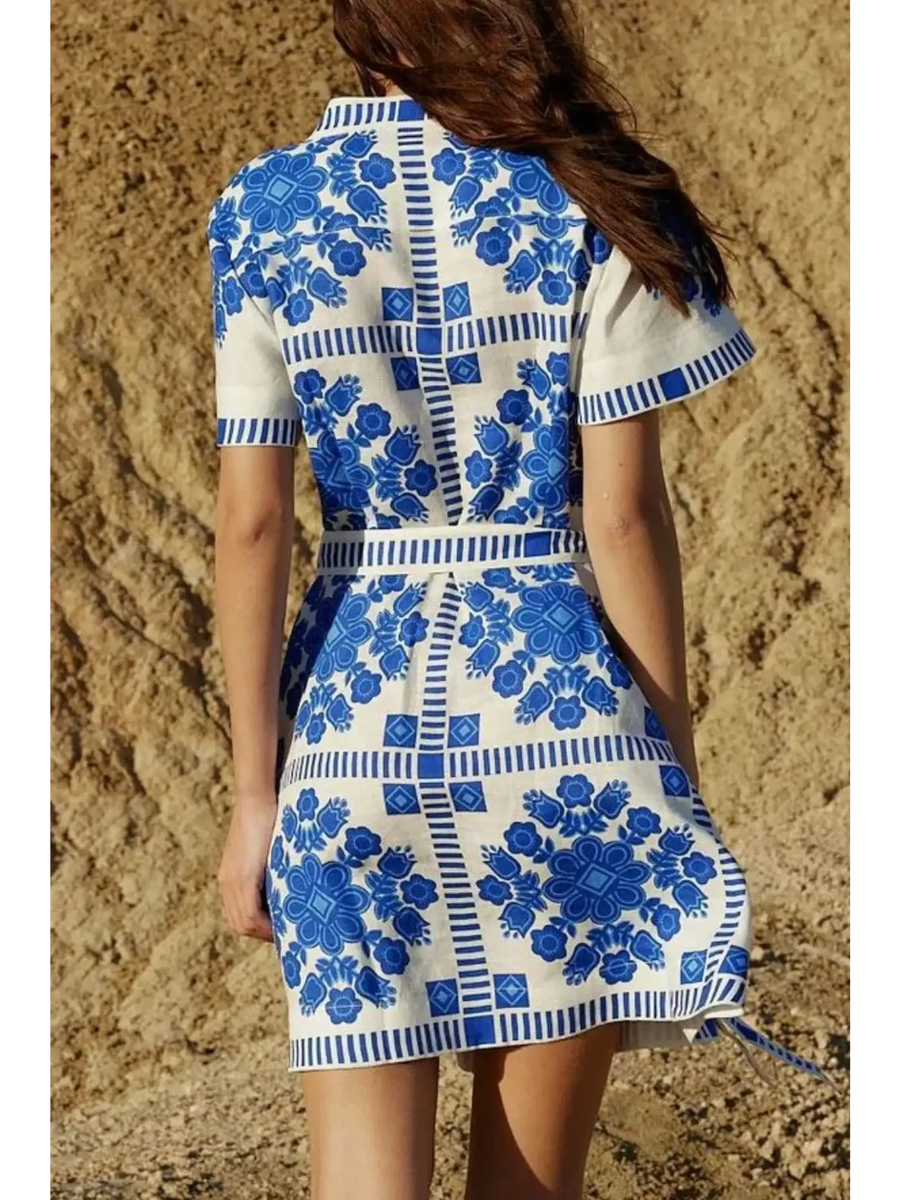 Trendsi women's resort wear short sleeve dress with blue floral print and mini dress silhouette
