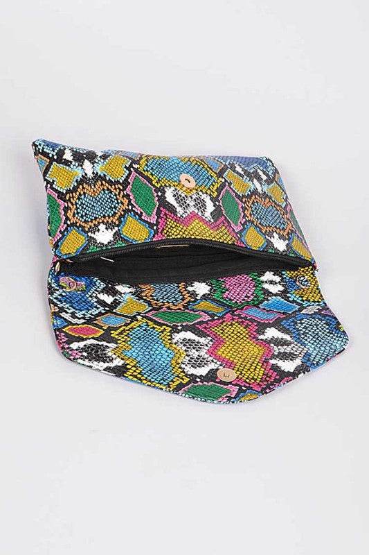 Babe Beachwaer women's snake print handbag with colorful pattern and snap closure open to show interior