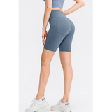 Babe Beachwear women's sports shorts with pockets in blue, high-waisted and fitted for active wear