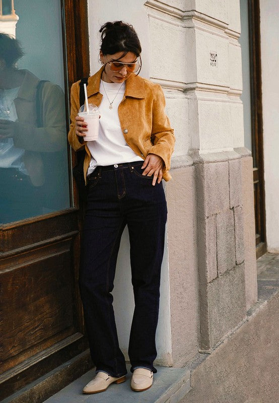 Rag Company women's studded suede loafers worn with casual outfit featuring white top and brown jacket