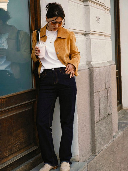 Rag Company women's studded suede loafers worn with casual outfit featuring white top and brown jacket