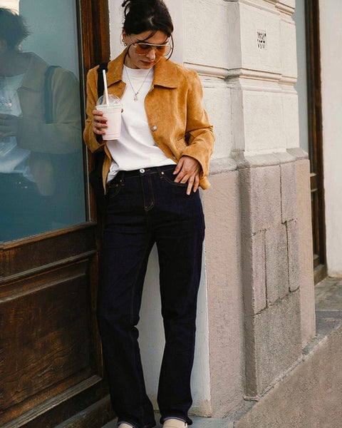Rag Company women's studded suede loafers worn with casual outfit featuring white top and brown jacket