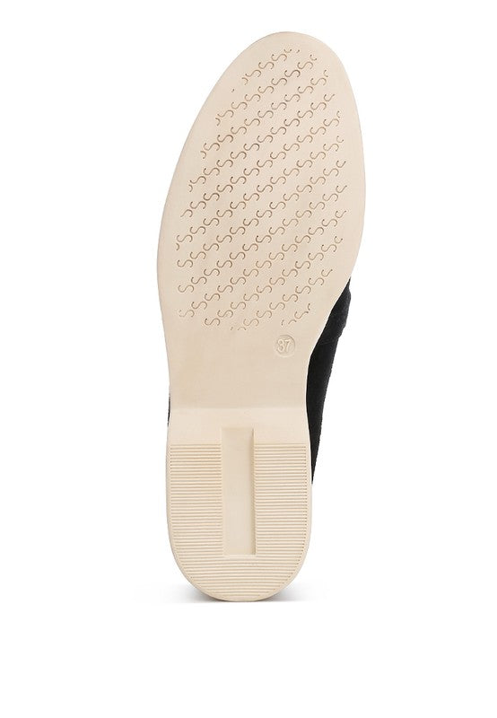 Sole view of Rag Company women's suede loafers showing beige textured non-slip outsole