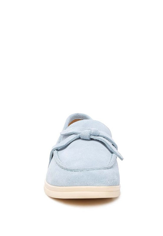 Rag Company women's suede loafers in light blue with bow detail and cream sole front view