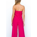 Trendsi women's tube top and pants set in vibrant pink shown from the back with strapless top and wide-leg pants